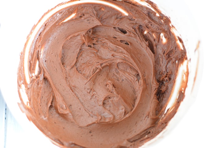 Chocolate icing in a bowl.