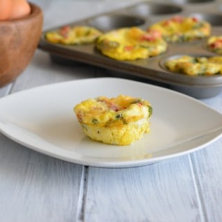 Roasted Pepper & Egg Breakfast Muffin on a white plate.