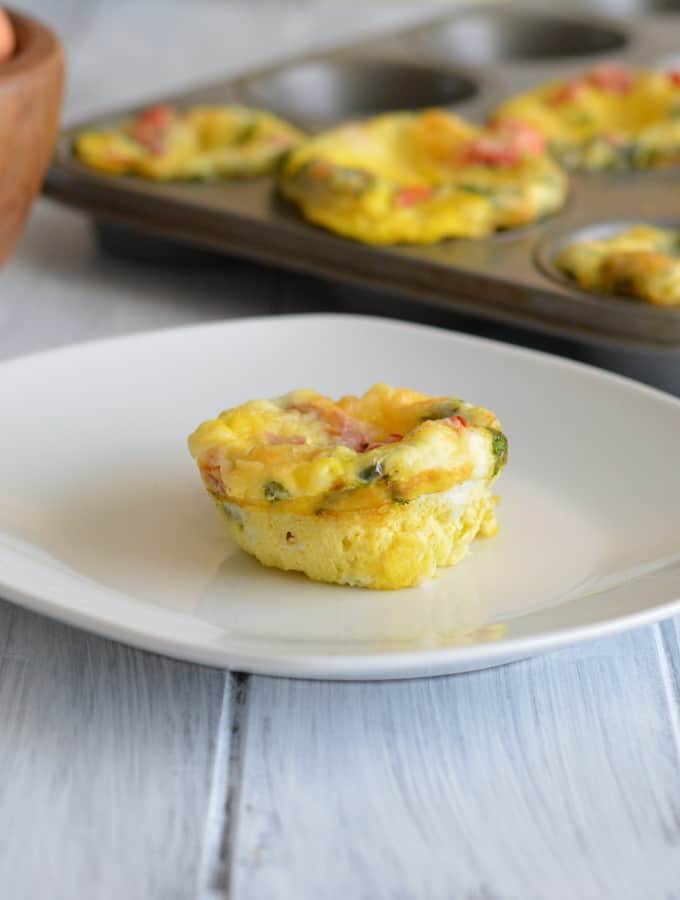 Roasted Pepper & Egg Breakfast Muffin on a white plate.