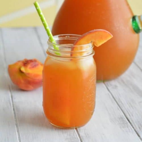 Peach iced tea in a mason jar.