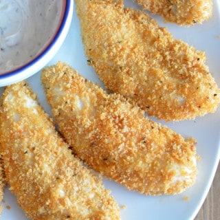 Baked chicken tenders marinated in ranch dressing are just as good as fried without all the fat.