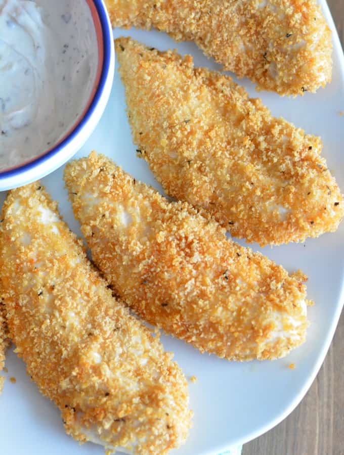 Baked chicken tenders marinated in ranch dressing are just as good as fried without all the fat.