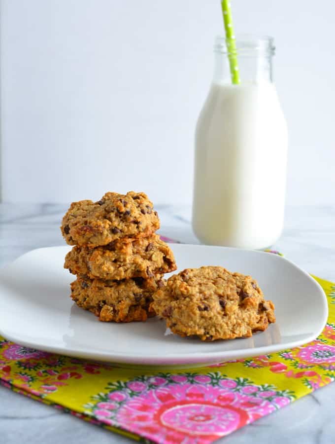 Peanut Butter Oatmeal Breakfast Cookie on a white plate with milk.