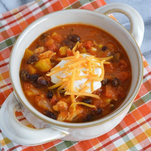 Leftover Turkey chili made with pumpkin puree, black beans, and butternut squash. A perfect way to use up leftover turkey.