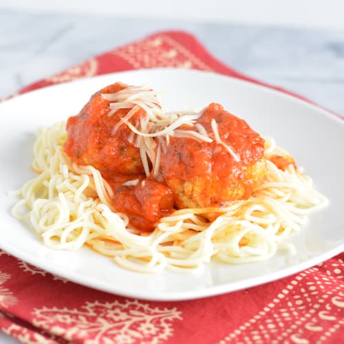 Turkey Meatballs with spaghetti on a plate.