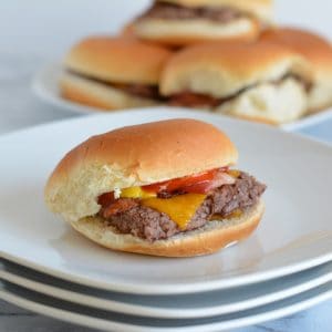 Bacon Cheddar Sliders are the perfect game day snack. Baked in the oven there is no need to turn on your grill. Pepperidge farm sliders make game day easy. #sponsored #easyrecipes #gamedayrecipes #respectthebun #snacks #sliders #burgers