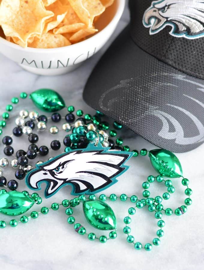 Eagle had next to a bowl of chips.