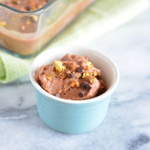 Chocolate Pistachio Ice Cream in a blue cup.