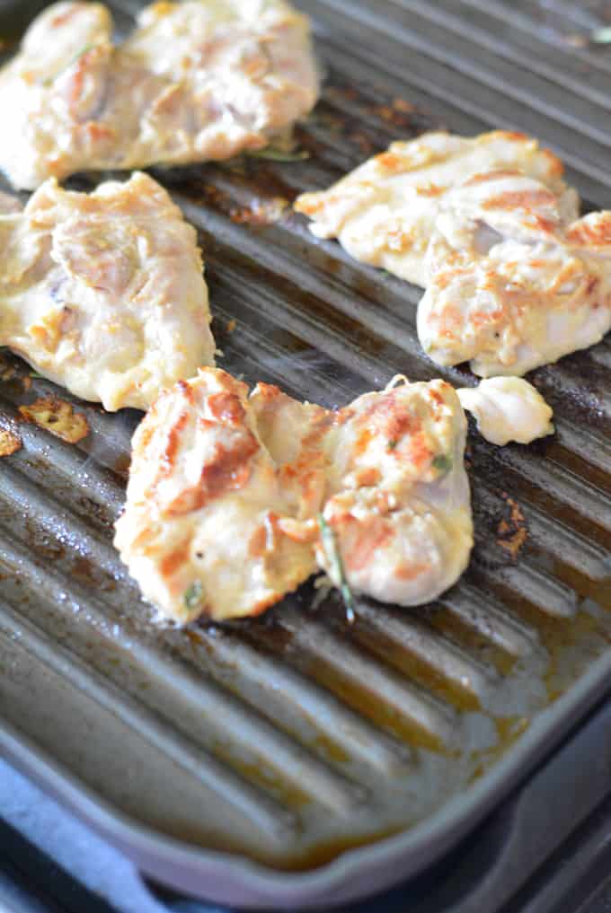 Grilled Chicken Thighs on a grill pan.