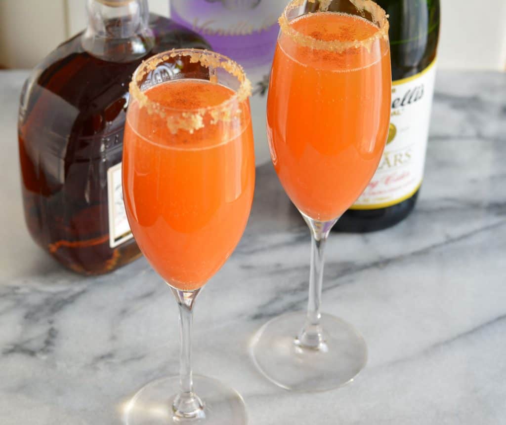 Pumpkin Fizz Cocktail in a champagne glass